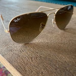 Ray Ban brushed gold aviator sunglasses.